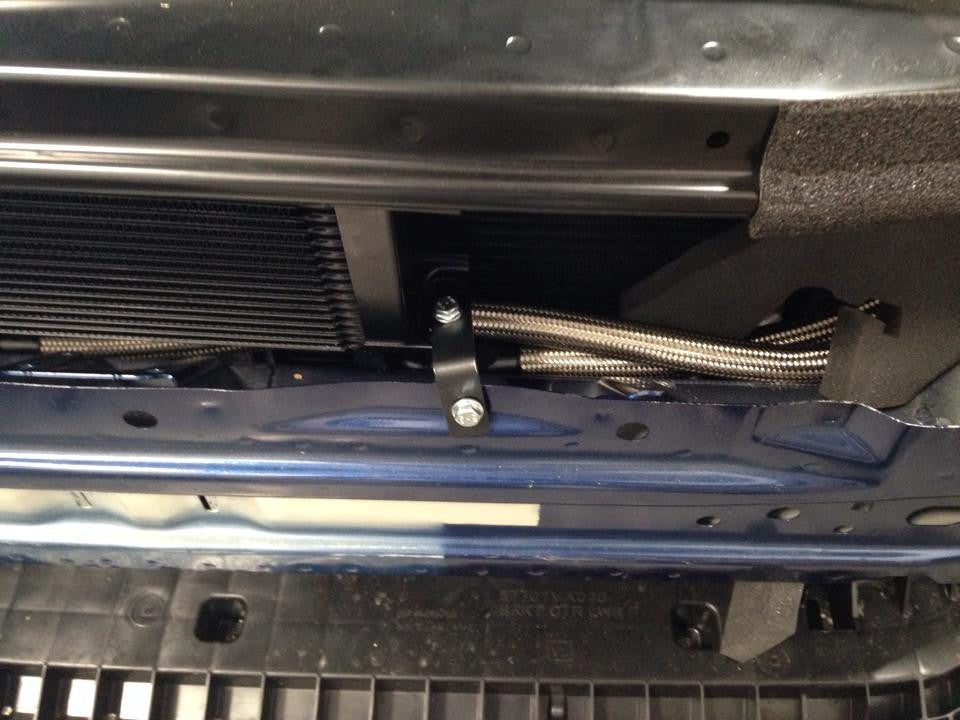 tomioka racing oil cooler kit wrx fa20dit thermostatic
wrx fa20 oil cooler core mounted behind grille
thermostatic sandwich plate for subaru wrx oil cooler
braided an oil lines wrx installation