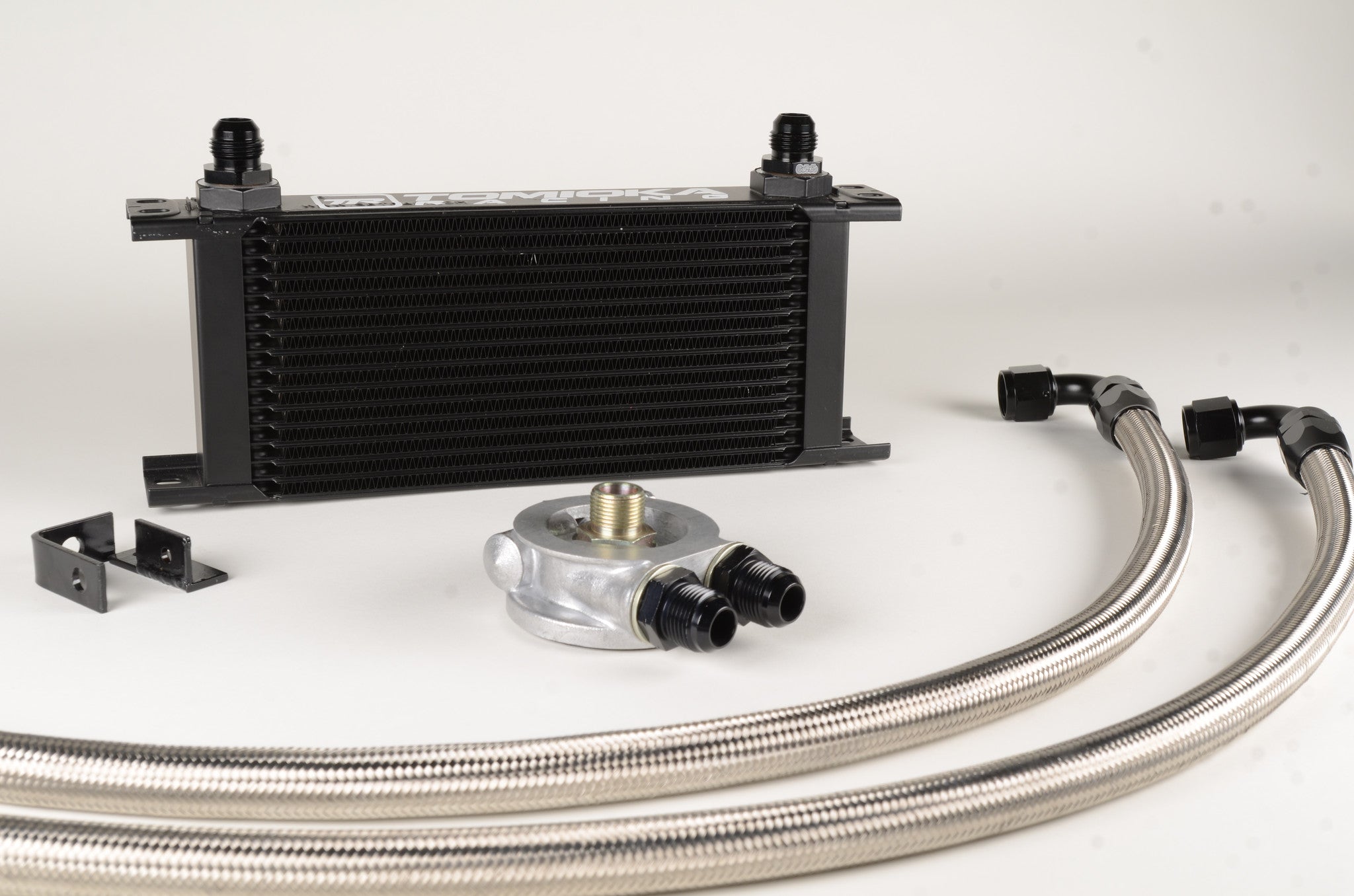 tomioka racing oil cooler kit wrx fa20dit thermostatic
wrx fa20 oil cooler core mounted behind grille
thermostatic sandwich plate for subaru wrx oil cooler
braided an oil lines wrx installation