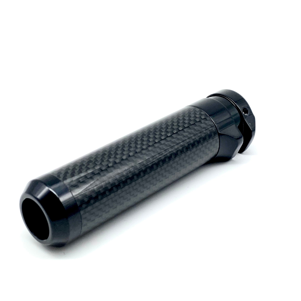 A black carbon fiber e-brake handle for vehicles, with chrome ends and a textured surface.