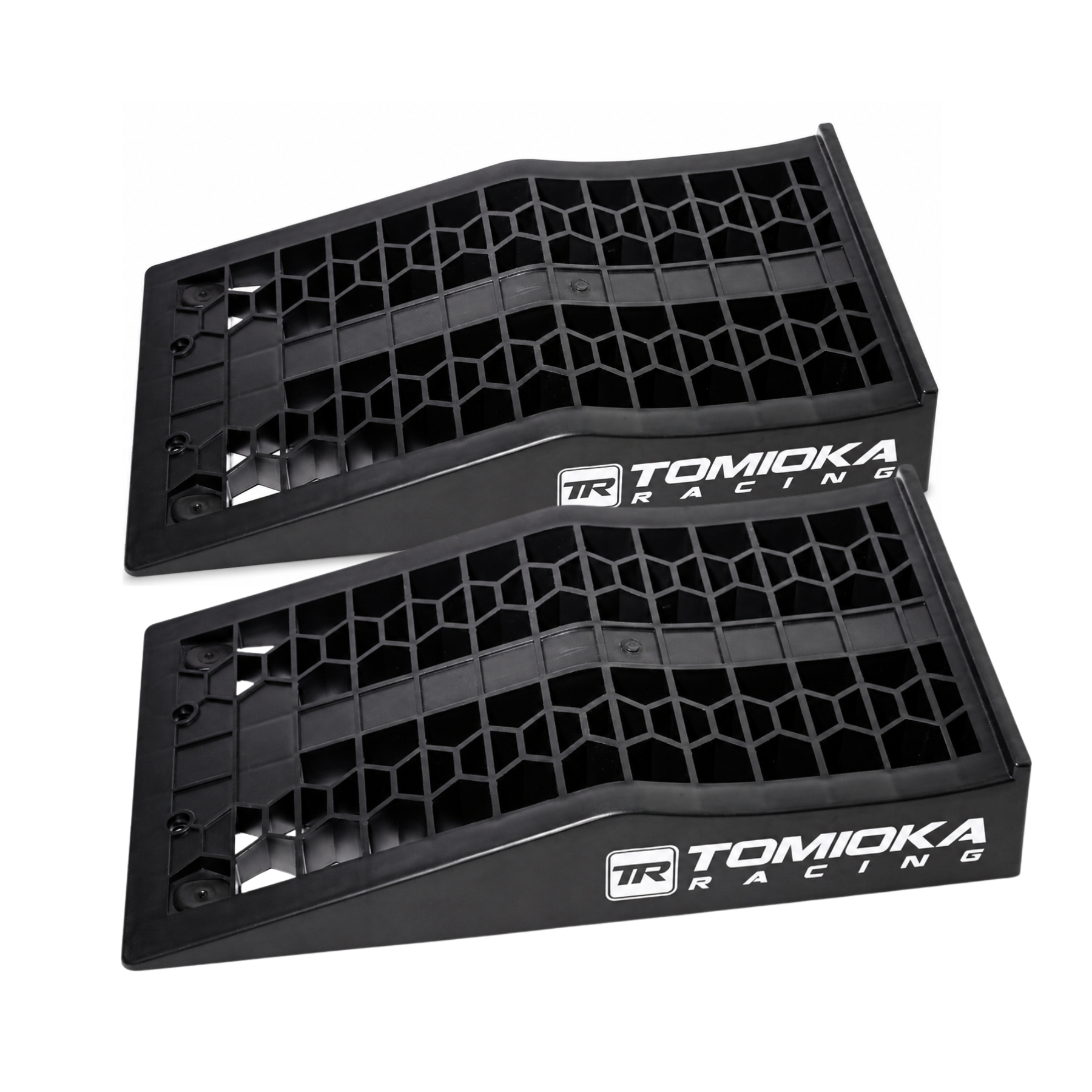 Two black honeycomb air filters with 'Tomioka Racing' branding on a white background