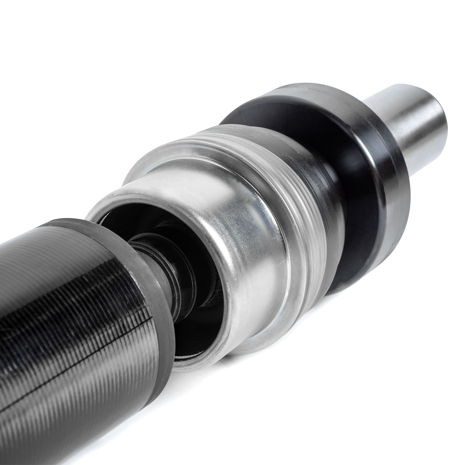 Angled close-up of the TR-DS1000 aluminum coupling, steel shaft and Toray T700 carbon fiber tube