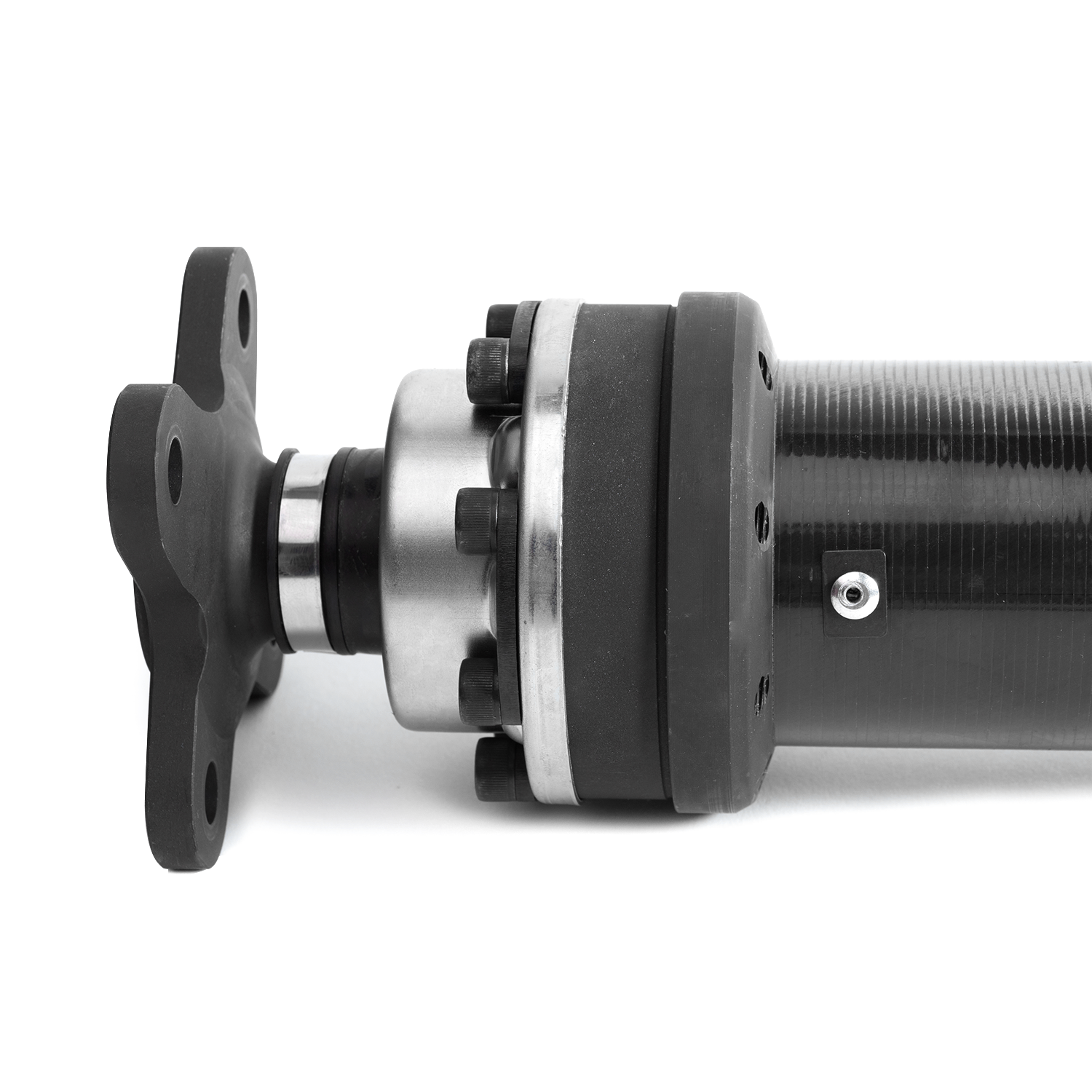Close-up of the Tomioka Racing TR-DS1000 flange assembly and carbon fiber driveshaft tube