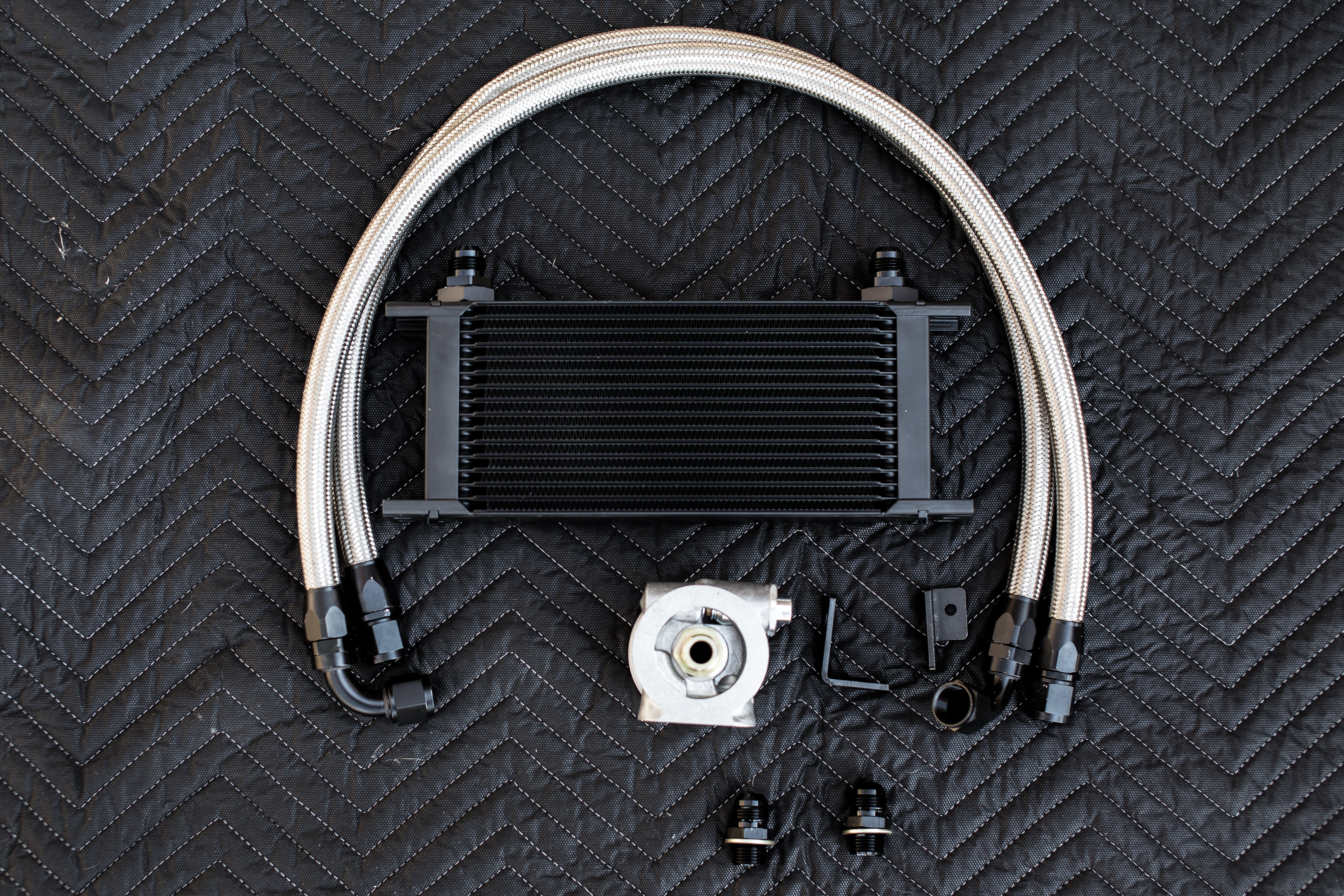 tomioka racing oil cooler kit wrx fa20dit thermostatic

wrx fa20 oil cooler core mounted behind grille

thermostatic sandwich plate for subaru wrx oil cooler

braided an oil lines wrx installation