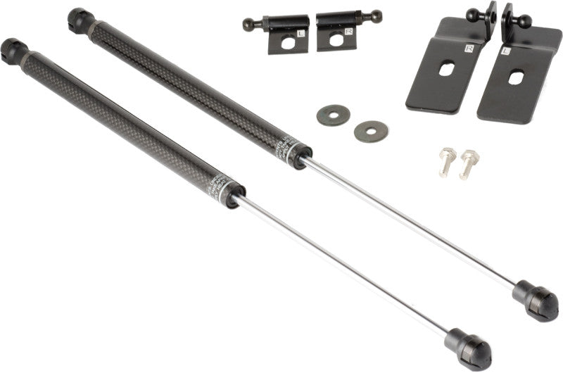 Two black carbon fiber hood dampers with mounting hardware and a heavy-duty ball joint.